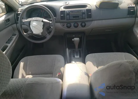 2002 Toyota Camry Le z USA, uszkodzony, nr VIN 4T1BE32K92U587235